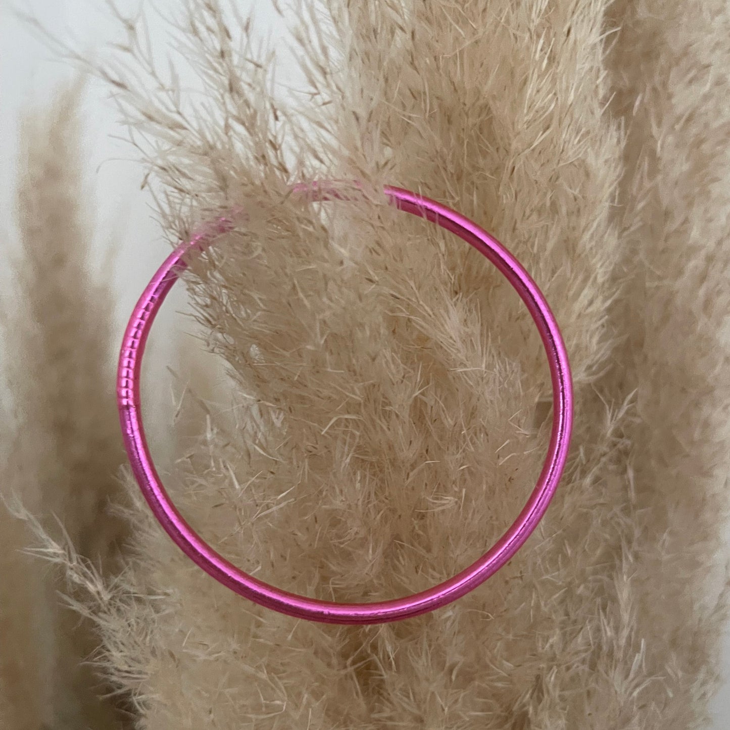 Jonc bouddhiste fin rose fuschia