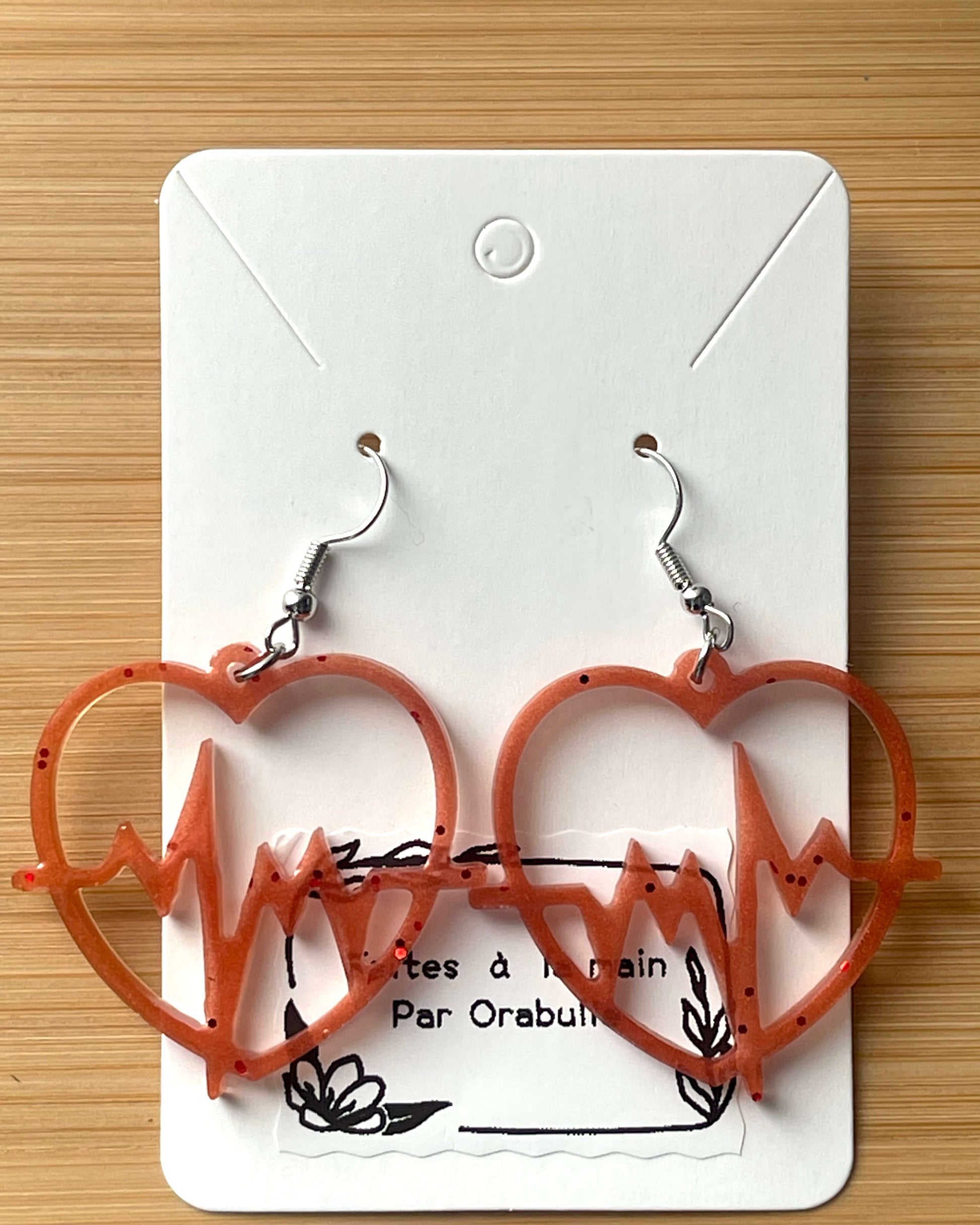 Boucles d'oreilles resines coeur battant terracotta