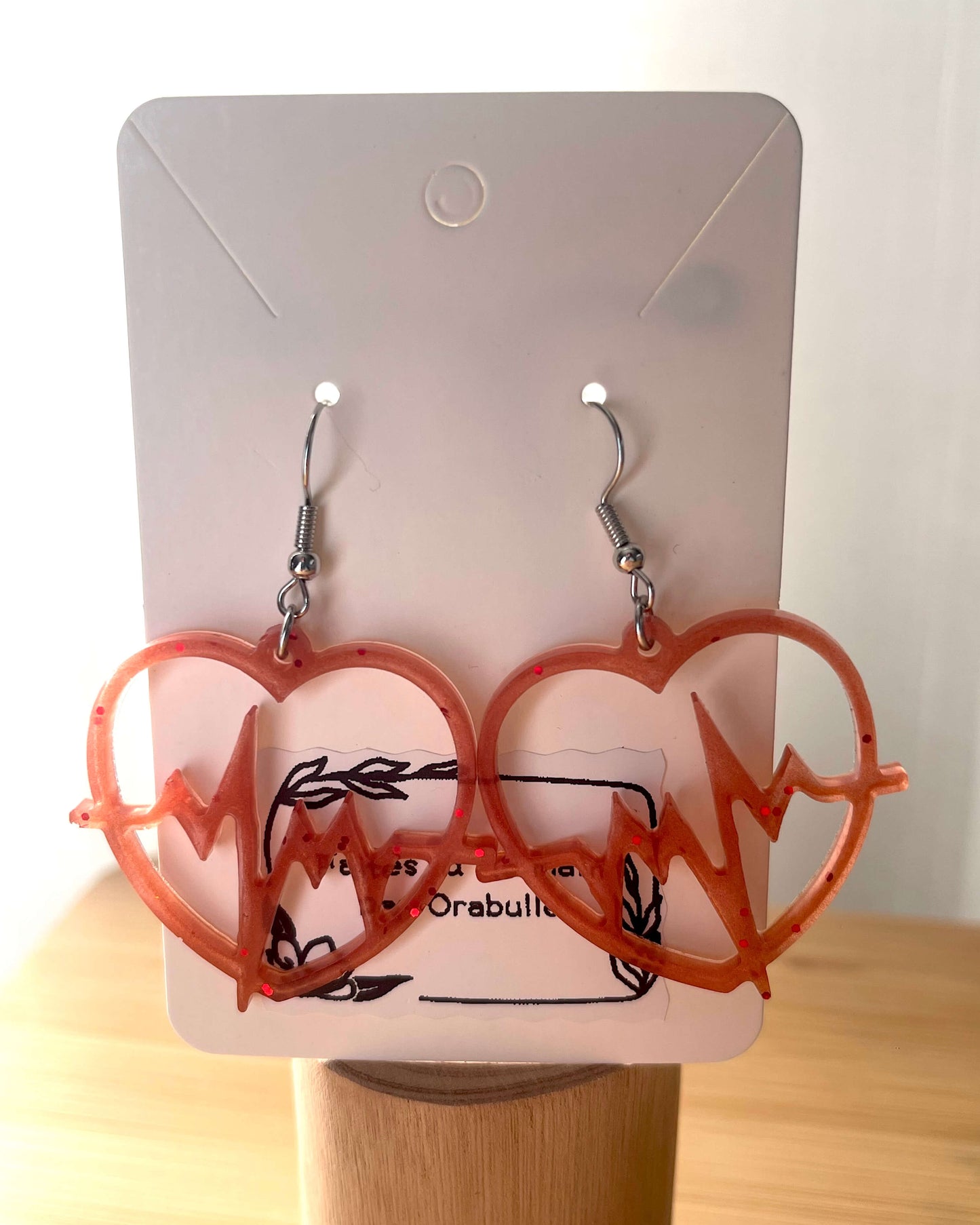 Boucles d'oreilles resines coeur battant terracotta